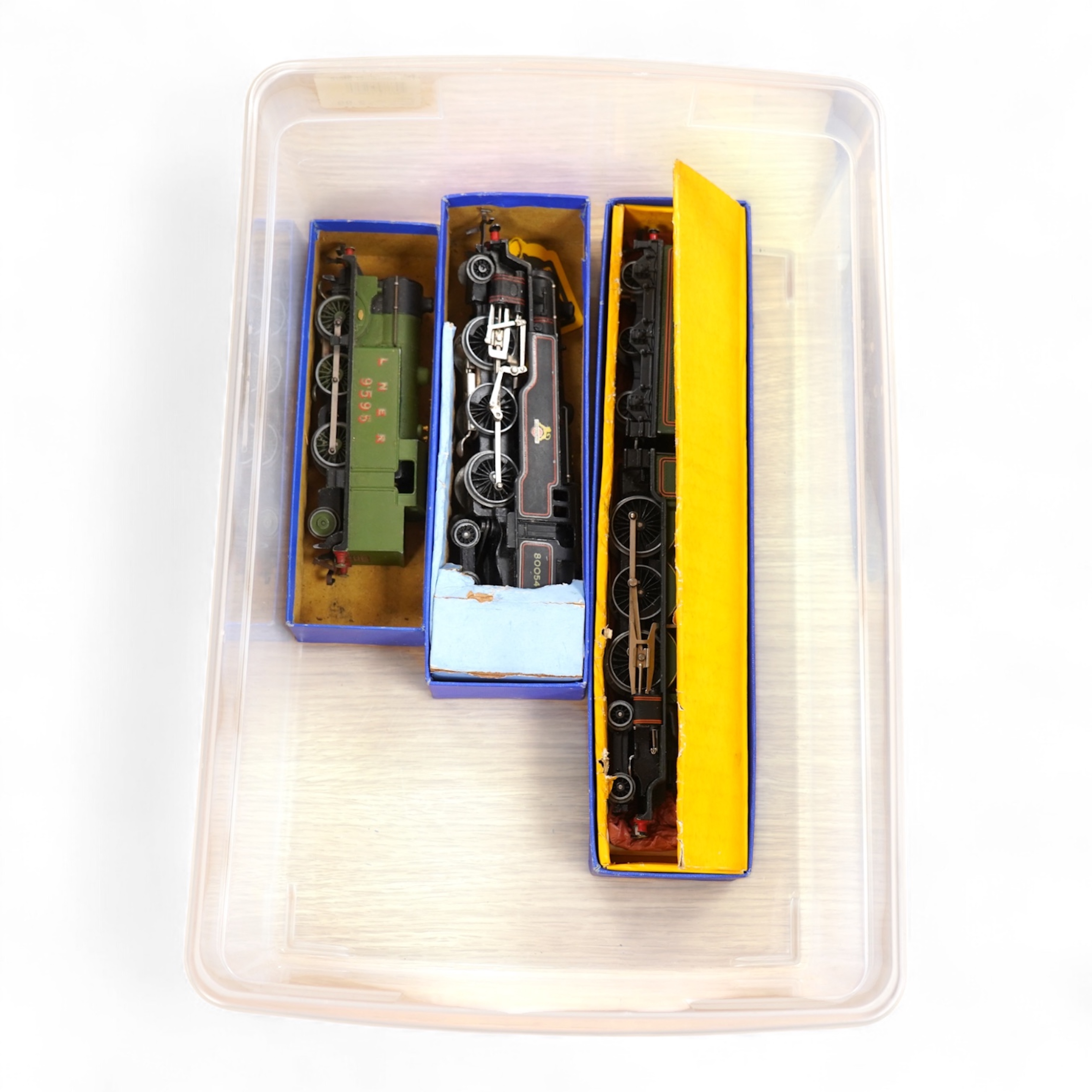 Three boxed Hornby Dublo locomotives for 3 rail running; an LNER Class N2 0-6-2T locomotive, 9595 (in the incorrect box for the BR version EDL17), a BR Bristol Castle, 7013 (EDLT20), and a BR Standard Class 4, 80054, (ED
